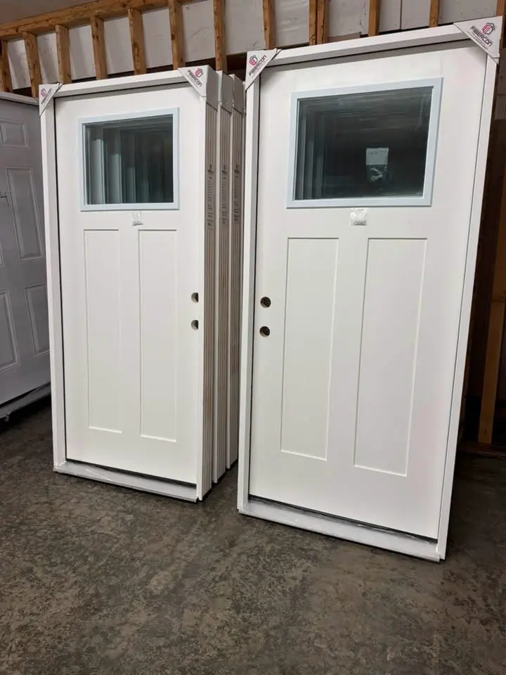 White doors with small upper glass windows