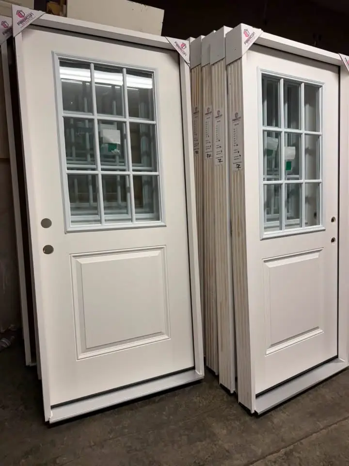White entry doors with decorative window grids