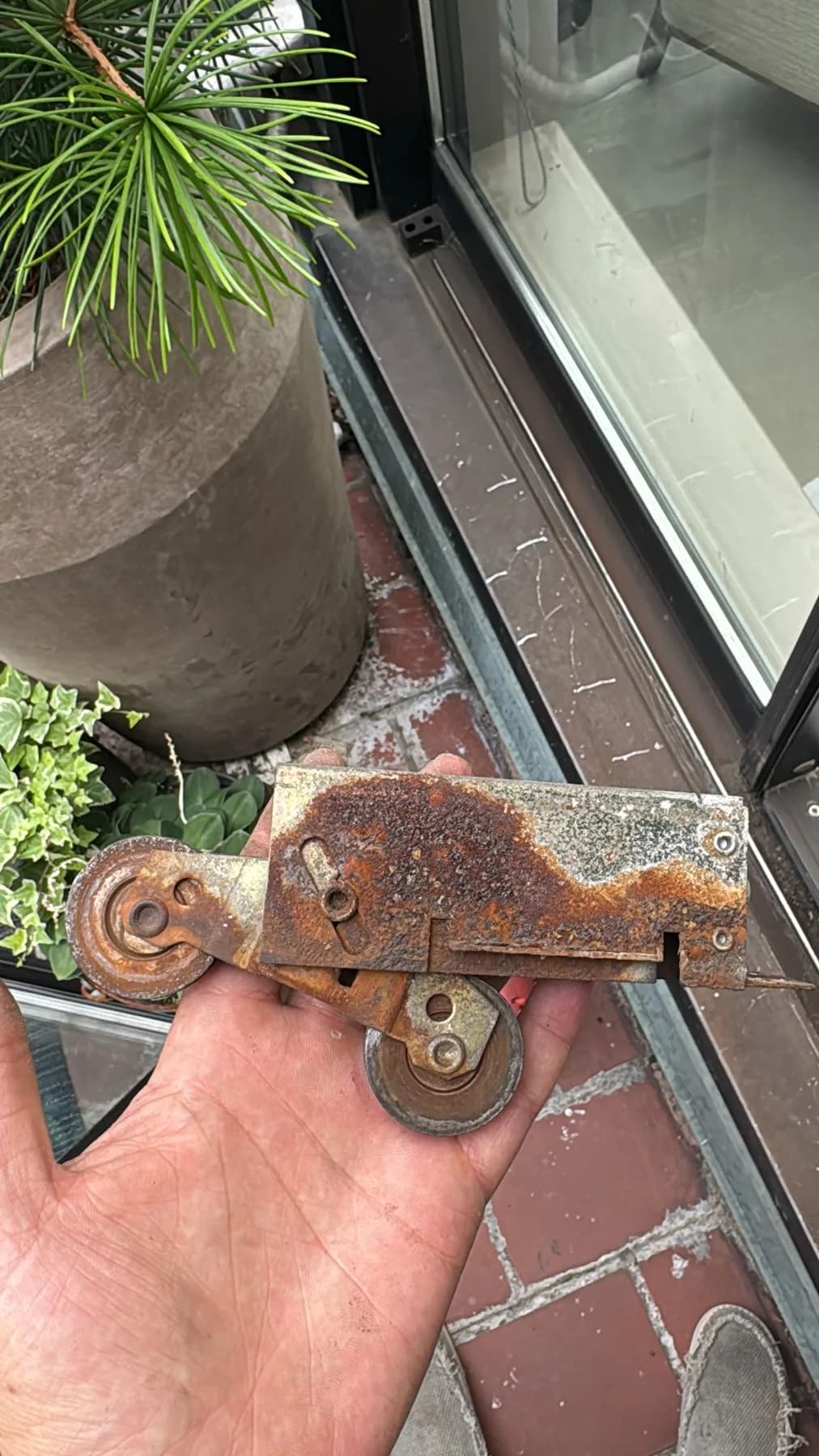 Sliding door roller wheel and track hardware during a repair