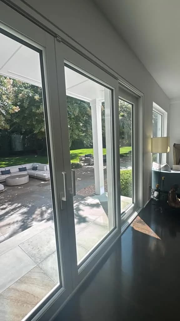 Wide glass sliding doors illustrating sliding door design and access