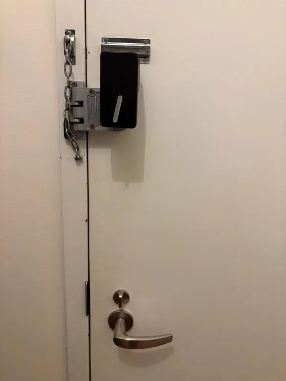 Door access-control lock hardware used for managed properties