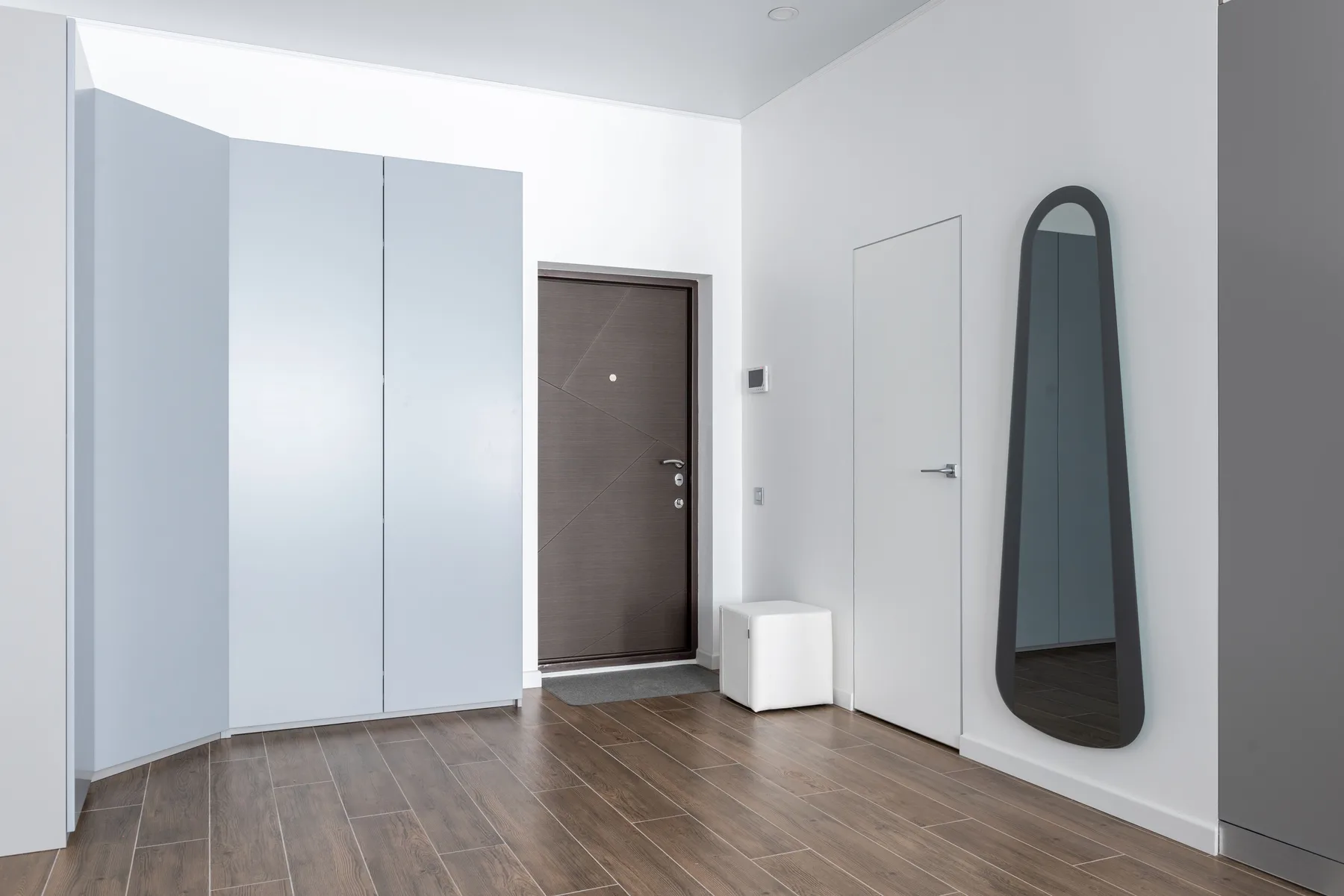 Gray front door white interior