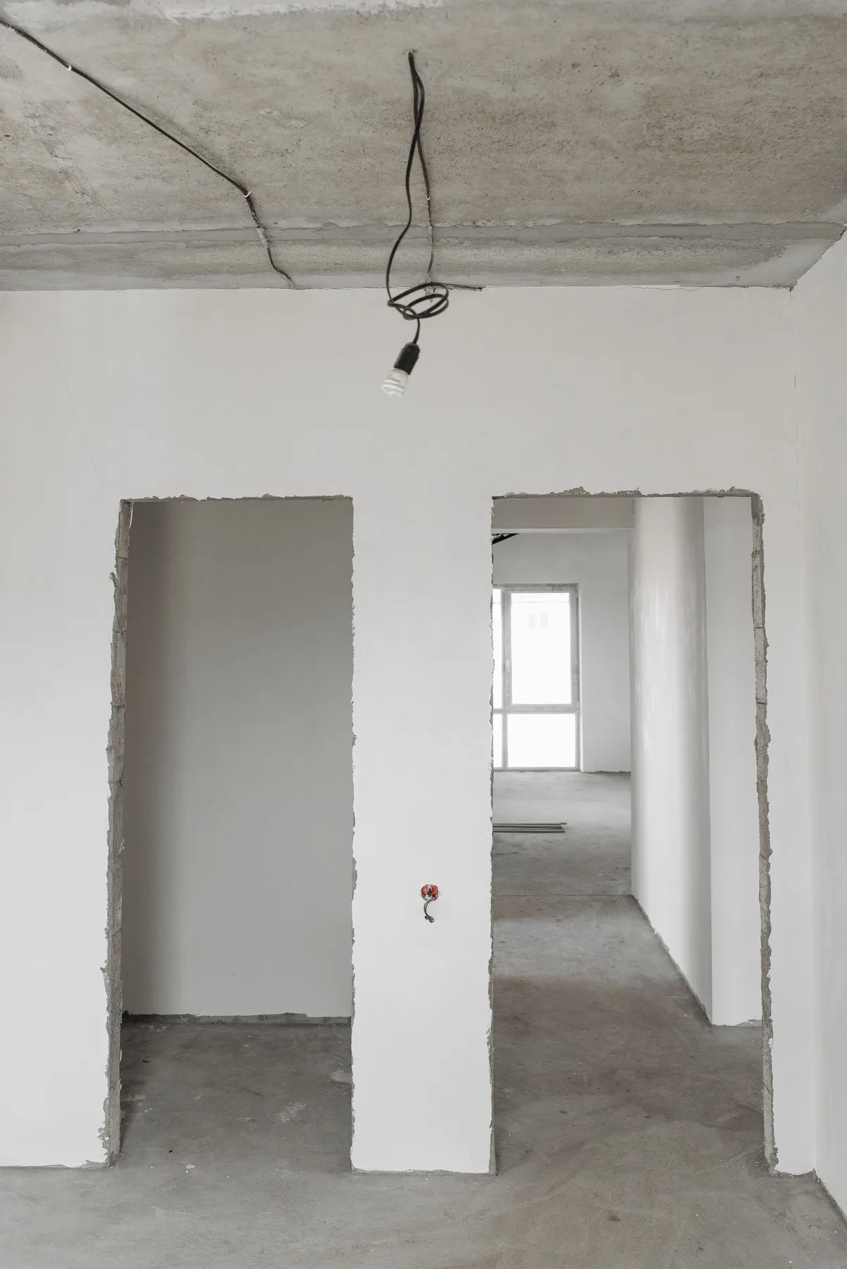 Unfinished room with door openings