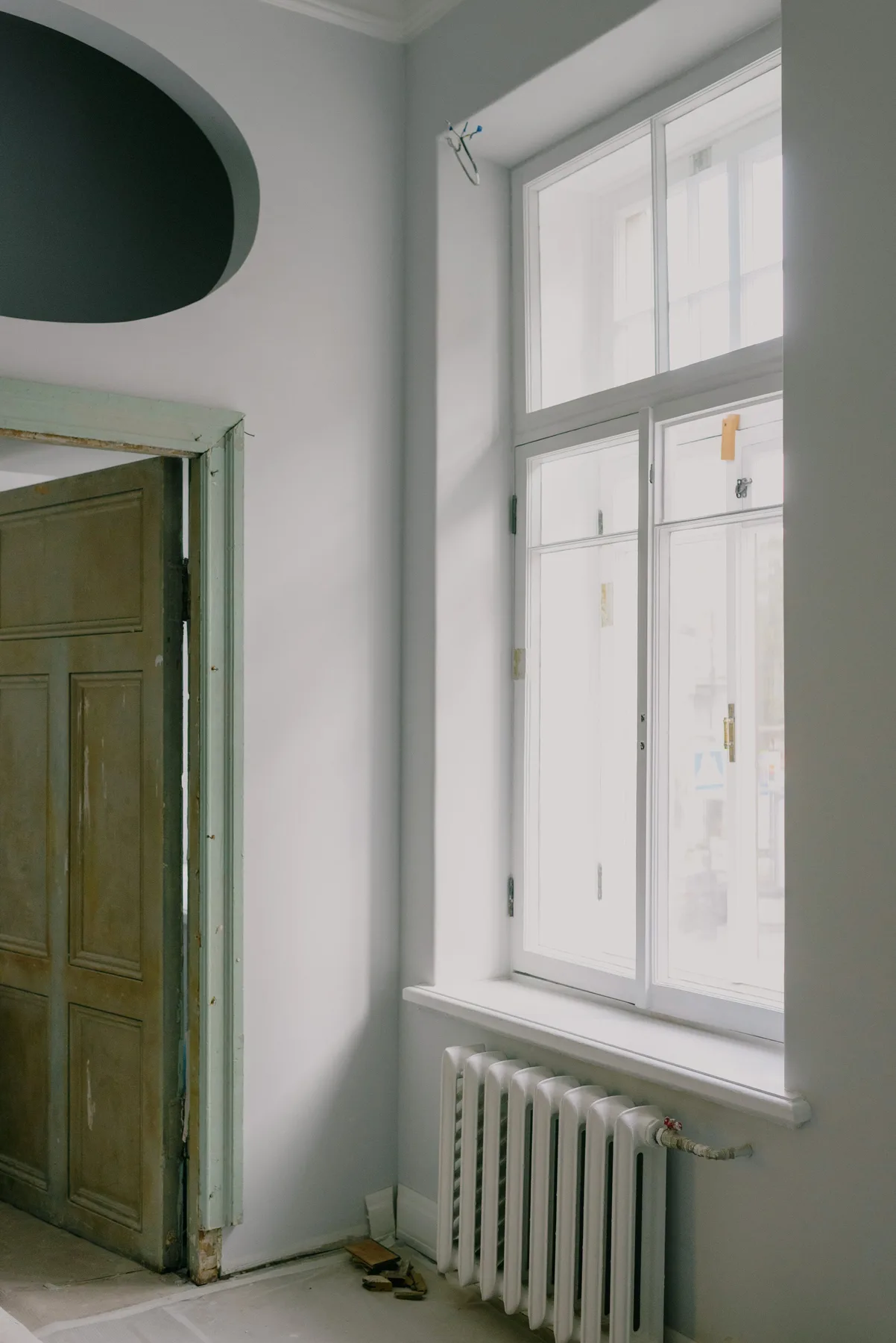 White exterior door with metal cladding