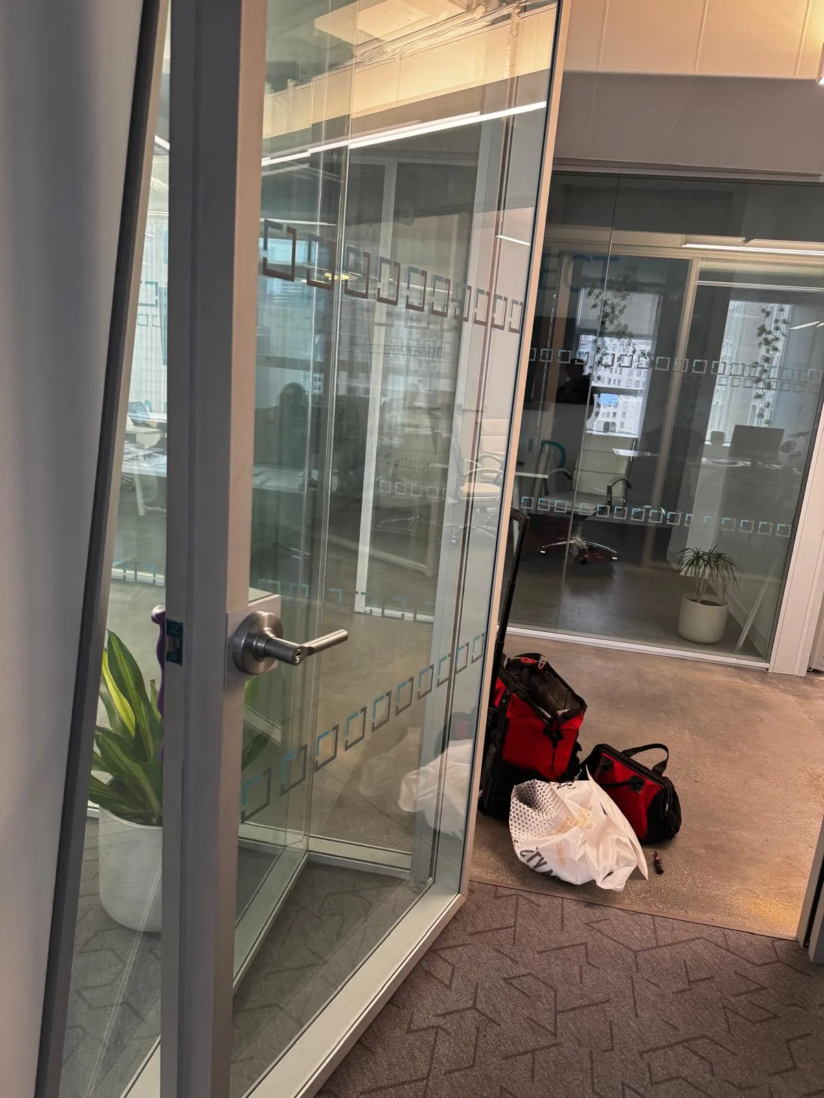 Glass office partition door repair
