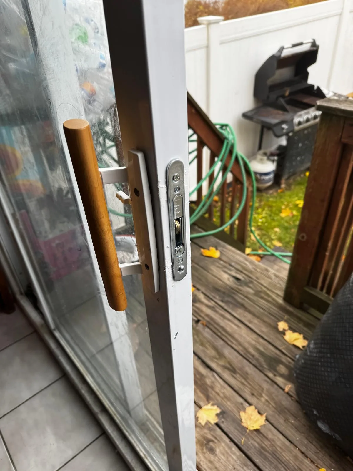 Sliding door lock plate removed