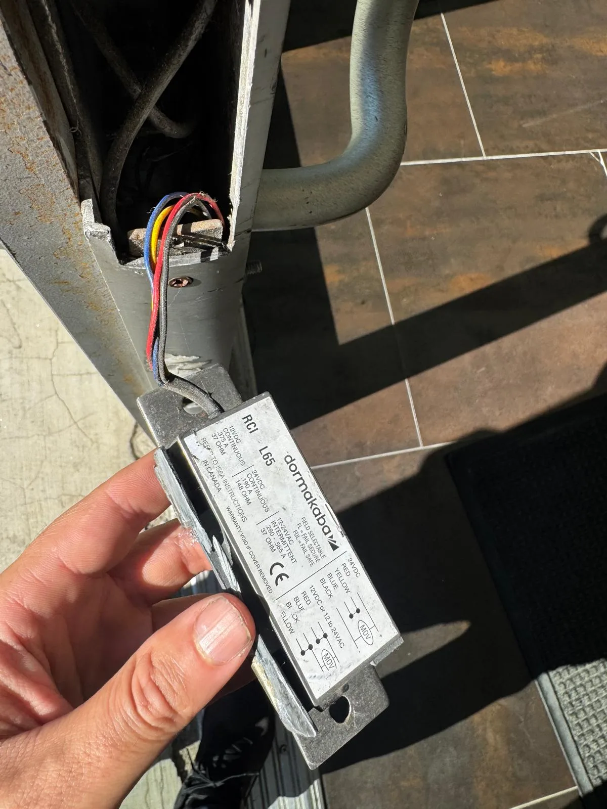Electric door strike lock component