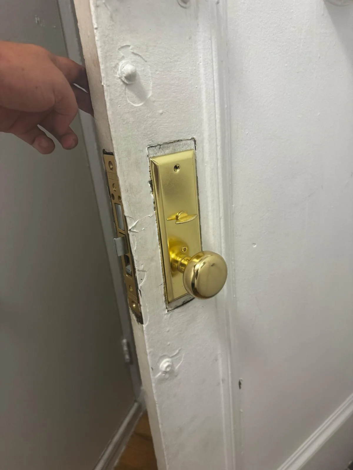 Mortise lock removal in progress