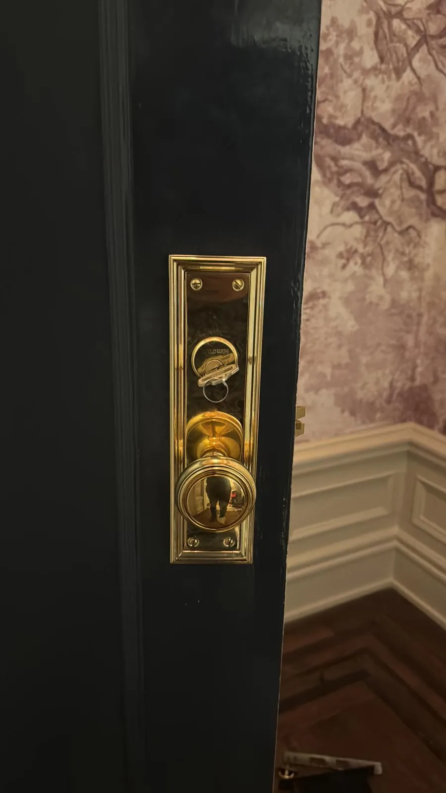 Ornate brass entry door hardware