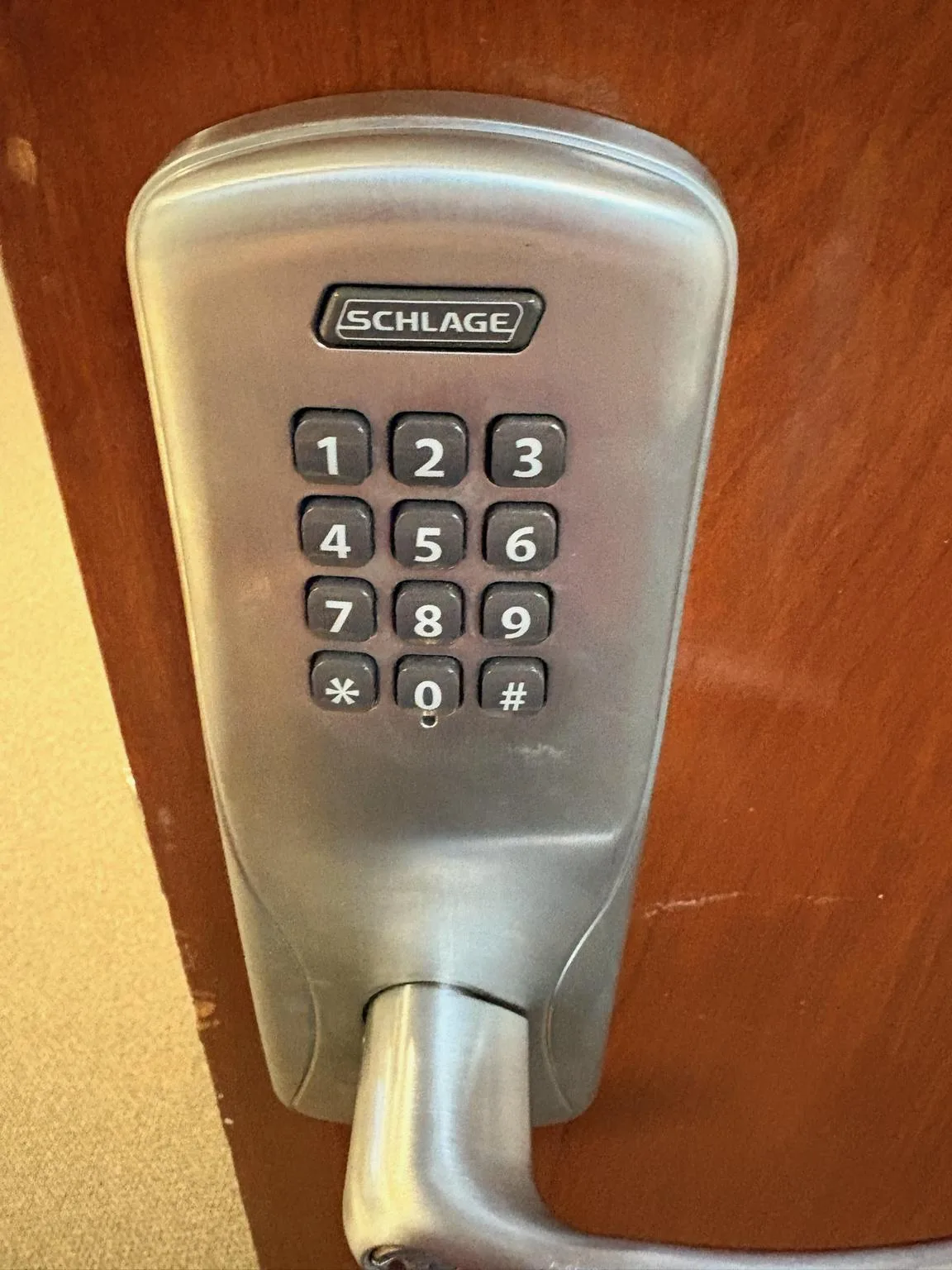 Keypad smart lock on wooden door